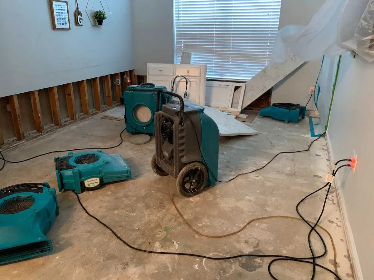 Dehumidifier in flood-cut room for Water Damage Restoration in Cleveland